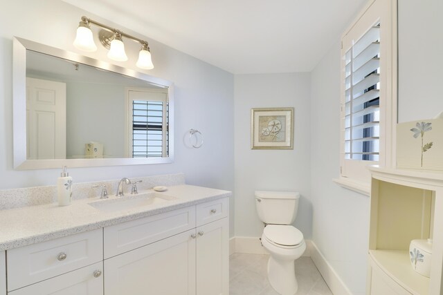 bedroom with visible vents, light colored carpet, and a ceiling fan