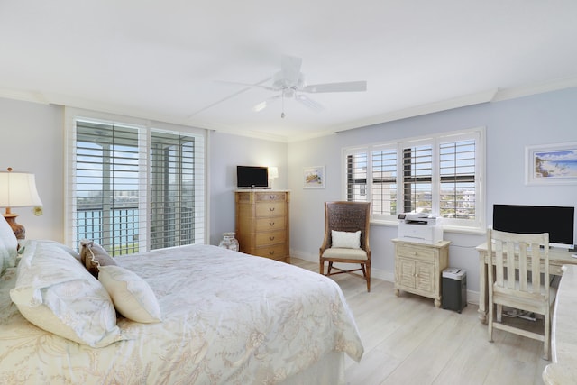 bedroom with ceiling fan, baseboards, light wood-style flooring, and ornamental molding