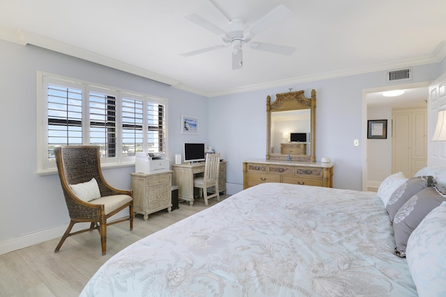 bedroom with a ceiling fan, visible vents, baseboards, crown molding, and light wood-type flooring