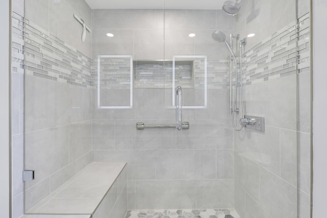 full bath featuring a shower stall