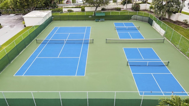 view of sport court with fence