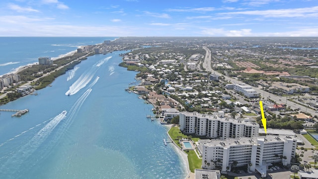 bird's eye view featuring a view of city and a water view