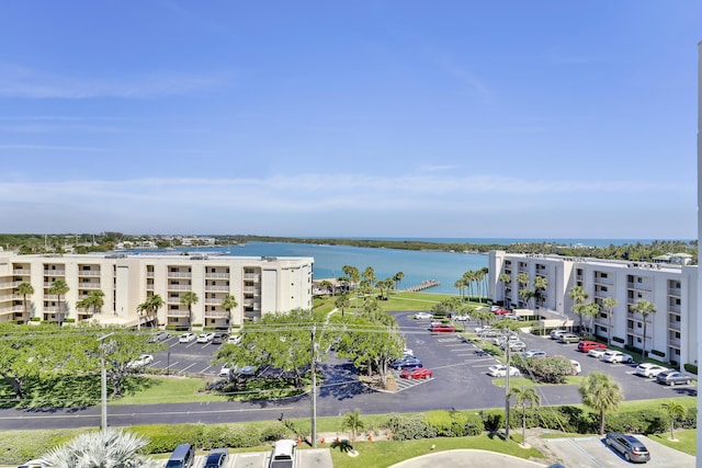 birds eye view of property featuring a water view