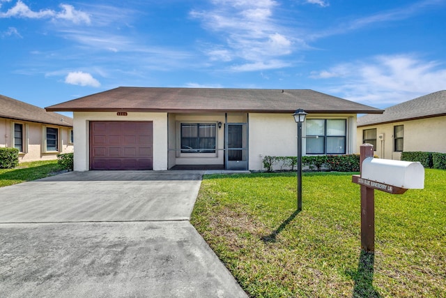 single story home featuring a front yard, an attached garage, driveway, and stucco siding