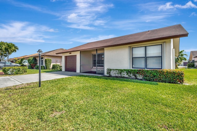 ranch-style home with stucco siding, driveway, an attached garage, and a front lawn