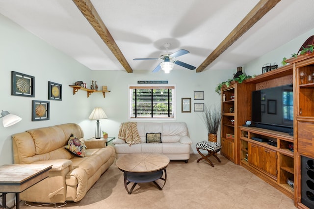 living room with beam ceiling and a ceiling fan