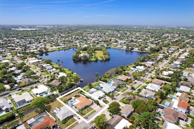 bird's eye view with a residential view and a water view