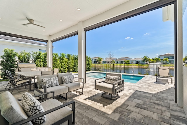 view of patio featuring a fenced in pool, an outdoor living space, outdoor dining area, a fenced backyard, and ceiling fan