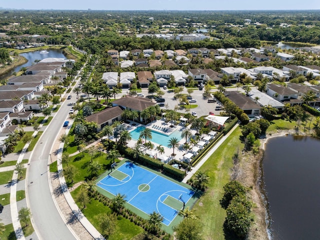 bird's eye view featuring a residential view and a water view