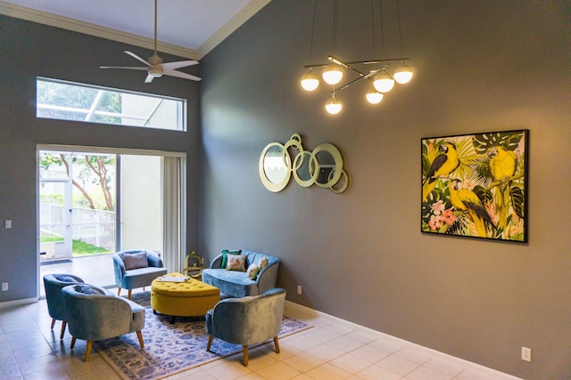 tiled living room with crown molding, a ceiling fan, baseboards, and high vaulted ceiling