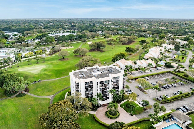 birds eye view of property with view of golf course