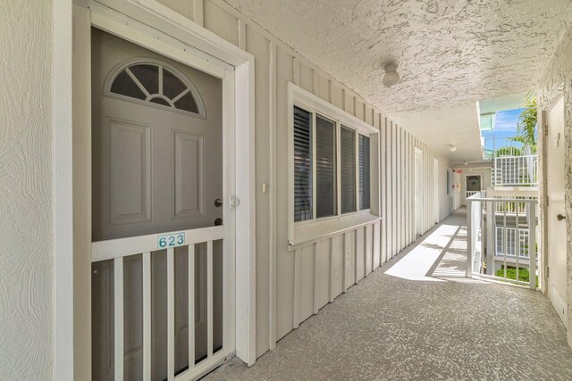 2400 S Ocean Dr Unit C623, Hutchinson Island, FL 34949 - doorway to property featuring board and batten siding