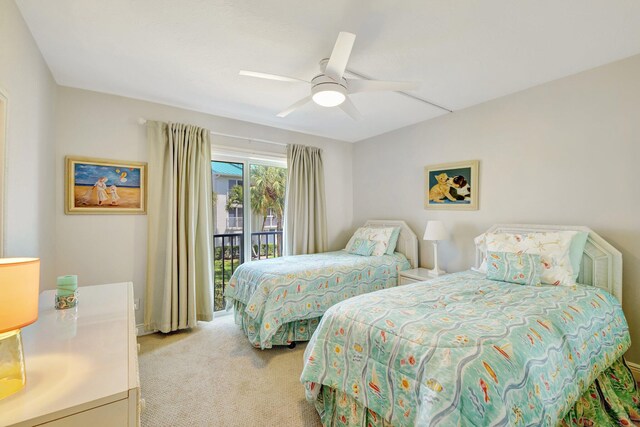 2400 S Ocean Dr Unit C623, Hutchinson Island, FL 34949 - bedroom with access to exterior, light carpet, and a ceiling fan