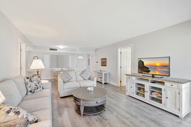 2400 S Ocean Dr Unit C623, Hutchinson Island, FL 34949 - living area featuring light wood-type flooring and baseboards