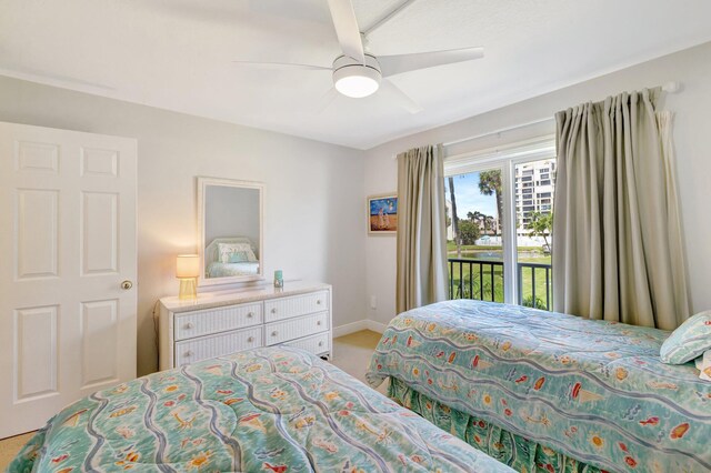 2400 S Ocean Dr Unit C623, Hutchinson Island, FL 34949 - bedroom with access to exterior, light colored carpet, baseboards, and a ceiling fan