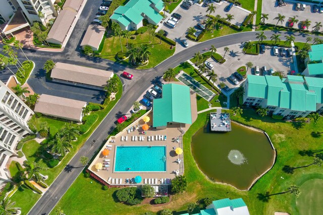 2400 S Ocean Dr Unit C623, Hutchinson Island, FL 34949 - drone / aerial view of a pool and a large body of water