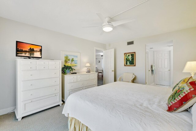2400 S Ocean Dr Unit C623, Hutchinson Island, FL 34949 - bedroom with light colored carpet and a ceiling fan
