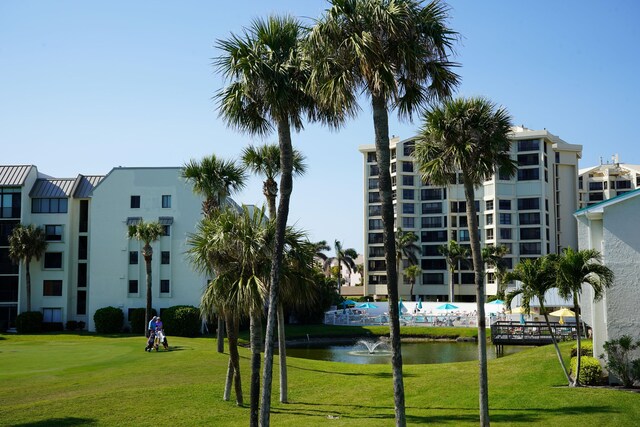 2400 S Ocean Dr Unit C623, Hutchinson Island, FL 34949 - view of community featuring a lawn and a water view