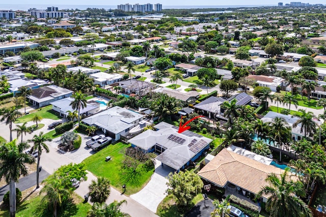 drone / aerial view with a city view and a residential view