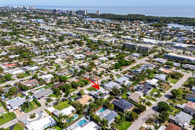 bird's eye view with a water view