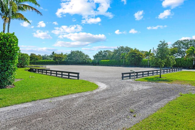 view of home's community with a lawn