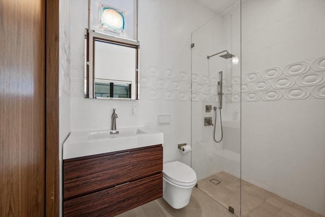 bathroom with vanity, toilet, and walk in shower