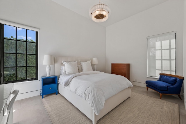 bedroom with lofted ceiling