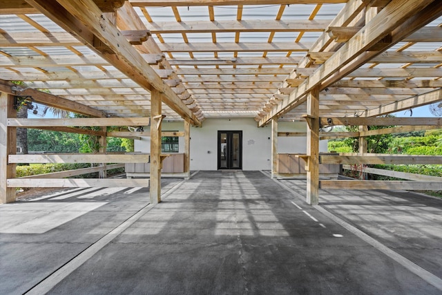 view of patio / terrace featuring french doors and a pergola