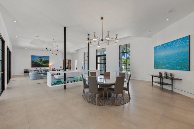 dining area with recessed lighting, baseboards, a chandelier, and light tile patterned floors