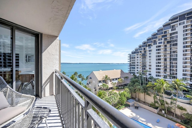 balcony featuring a water view