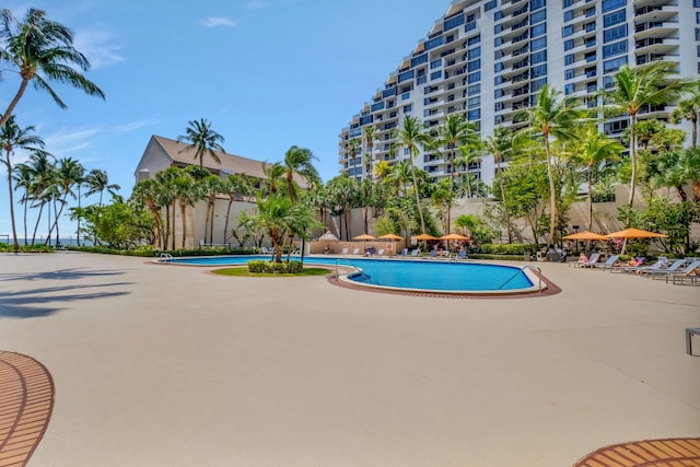 pool with a patio