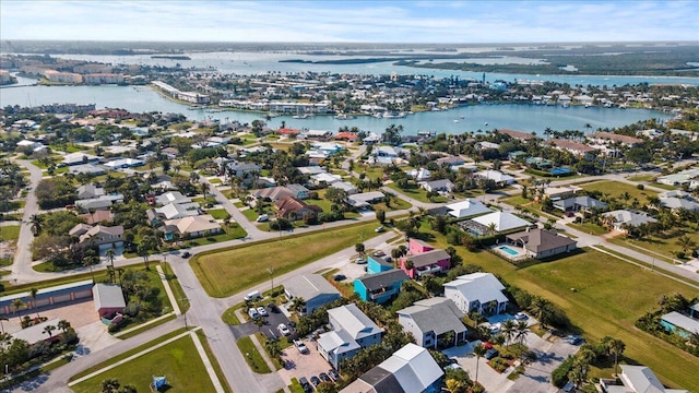 aerial view featuring a residential view and a water view