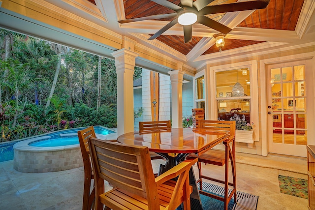 view of patio with an outdoor pool, an in ground hot tub, outdoor dining area, and a ceiling fan