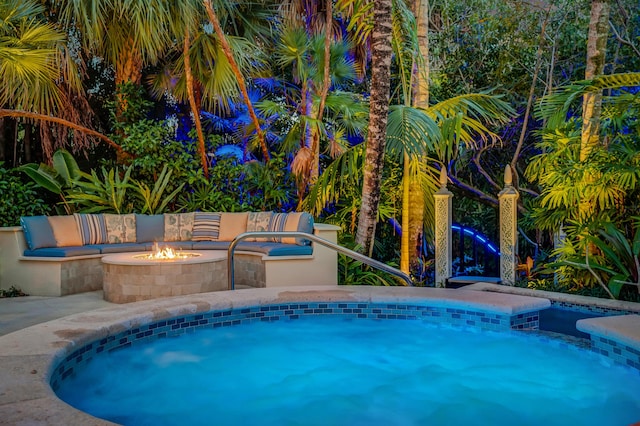 view of pool featuring a fire pit