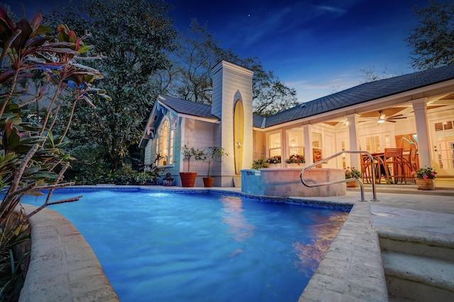 outdoor pool with a patio