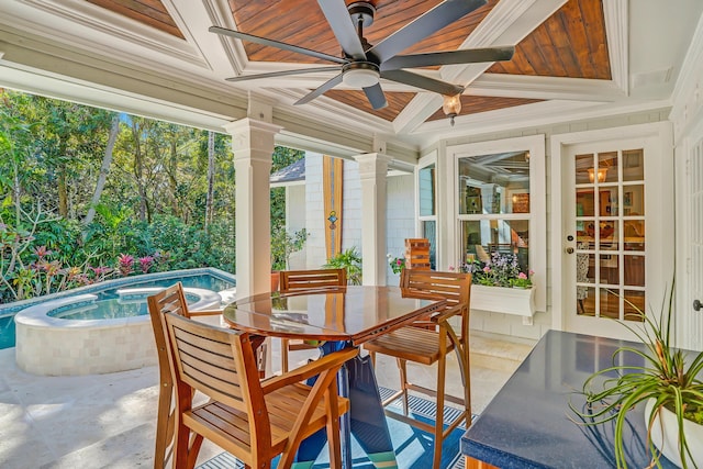 view of patio / terrace with an in ground hot tub, an outdoor pool, and ceiling fan