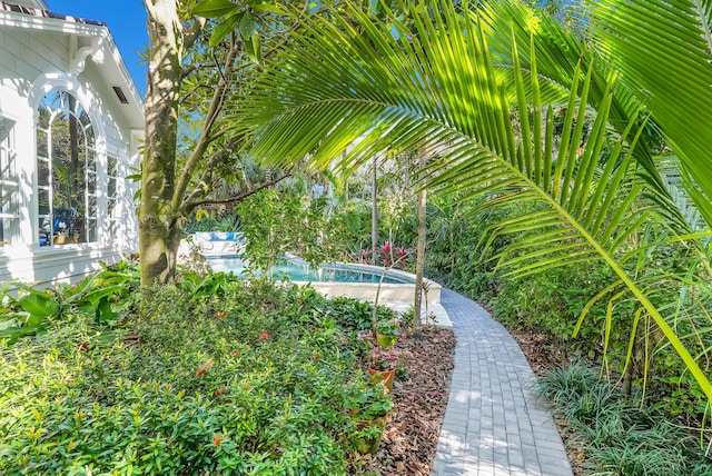 view of yard with an outdoor pool