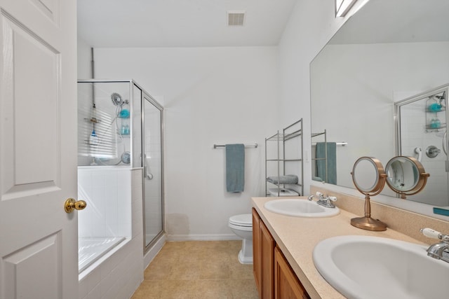 full bathroom featuring visible vents, a stall shower, toilet, and a sink