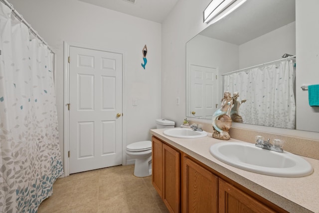 full bathroom with a sink, a shower with curtain, toilet, and double vanity