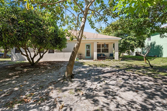 view of front of house featuring stucco siding