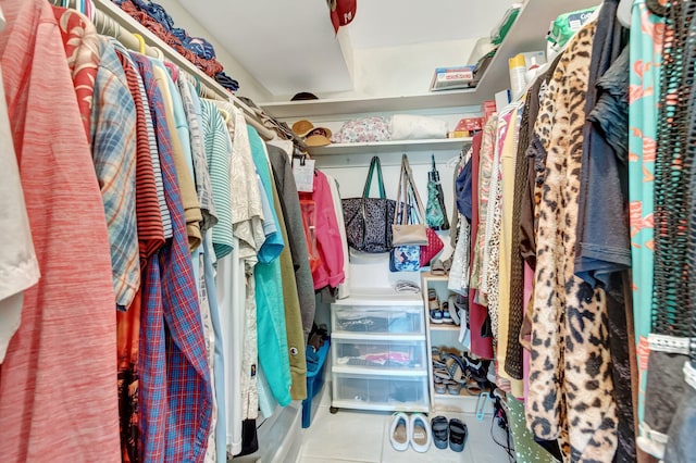 spacious closet featuring tile patterned flooring