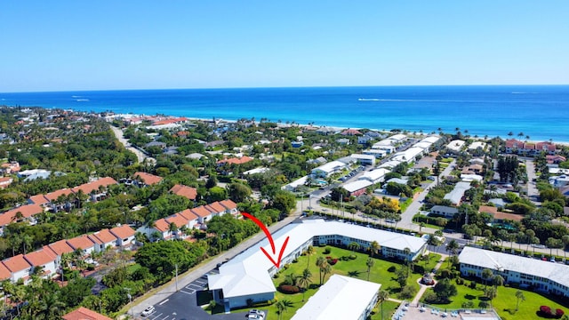 aerial view featuring a residential view and a water view