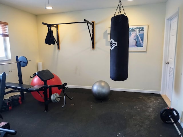 exercise area with baseboards