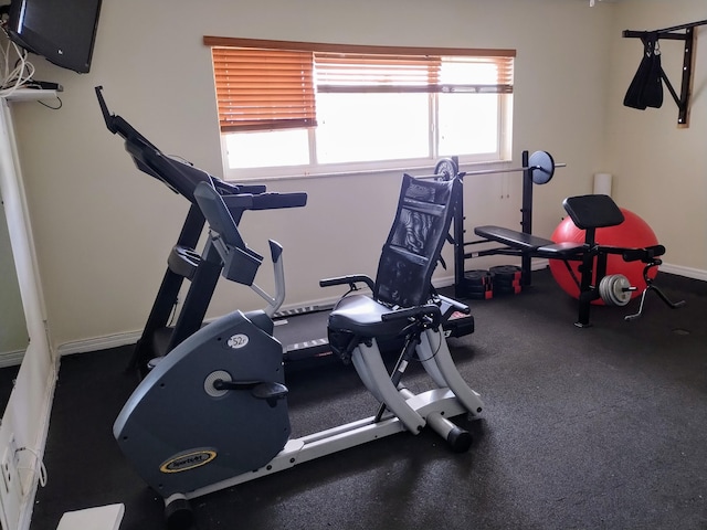 exercise area with baseboards