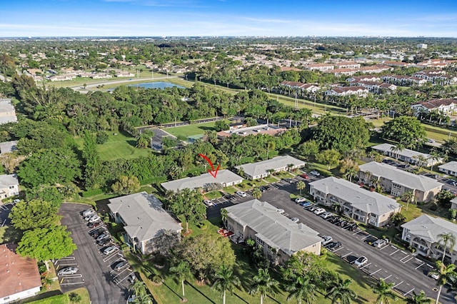 aerial view featuring a water view and a residential view