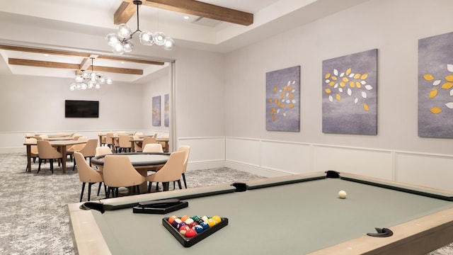 playroom with beam ceiling, a decorative wall, a tray ceiling, and carpet floors