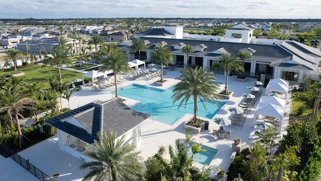 birds eye view of property with a residential view