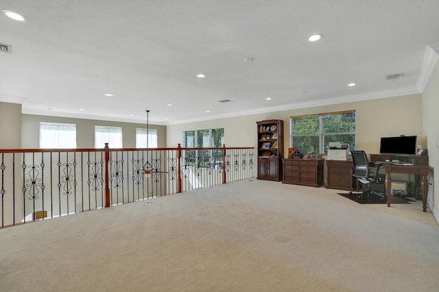 carpeted home office with recessed lighting, visible vents, plenty of natural light, and ornamental molding