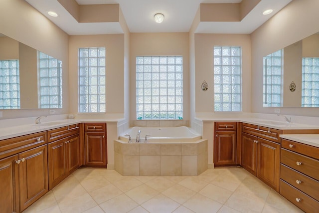 10733 Castle Oak Dr, Boynton Beach, FL 33473 - bathroom featuring a wealth of natural light, a bath, and a sink