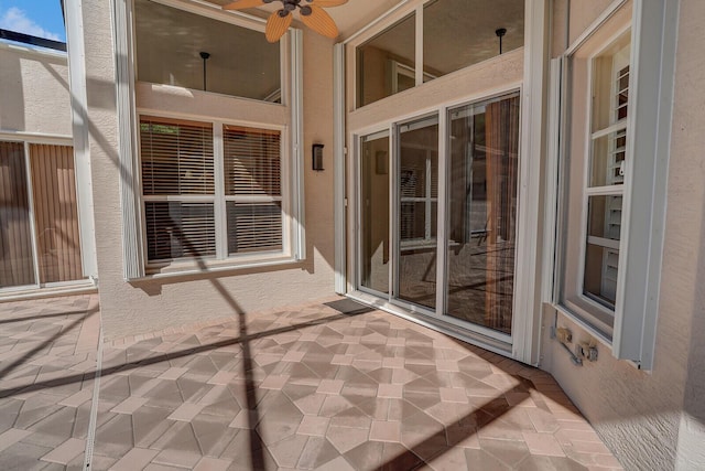 view of patio / terrace featuring ceiling fan